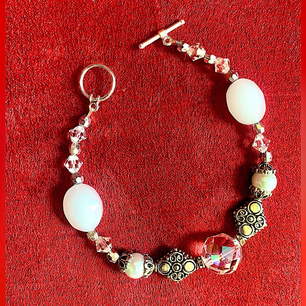 Handmade bracelet,delicate silver charms, pearls,sparkling beads,toggle clasp